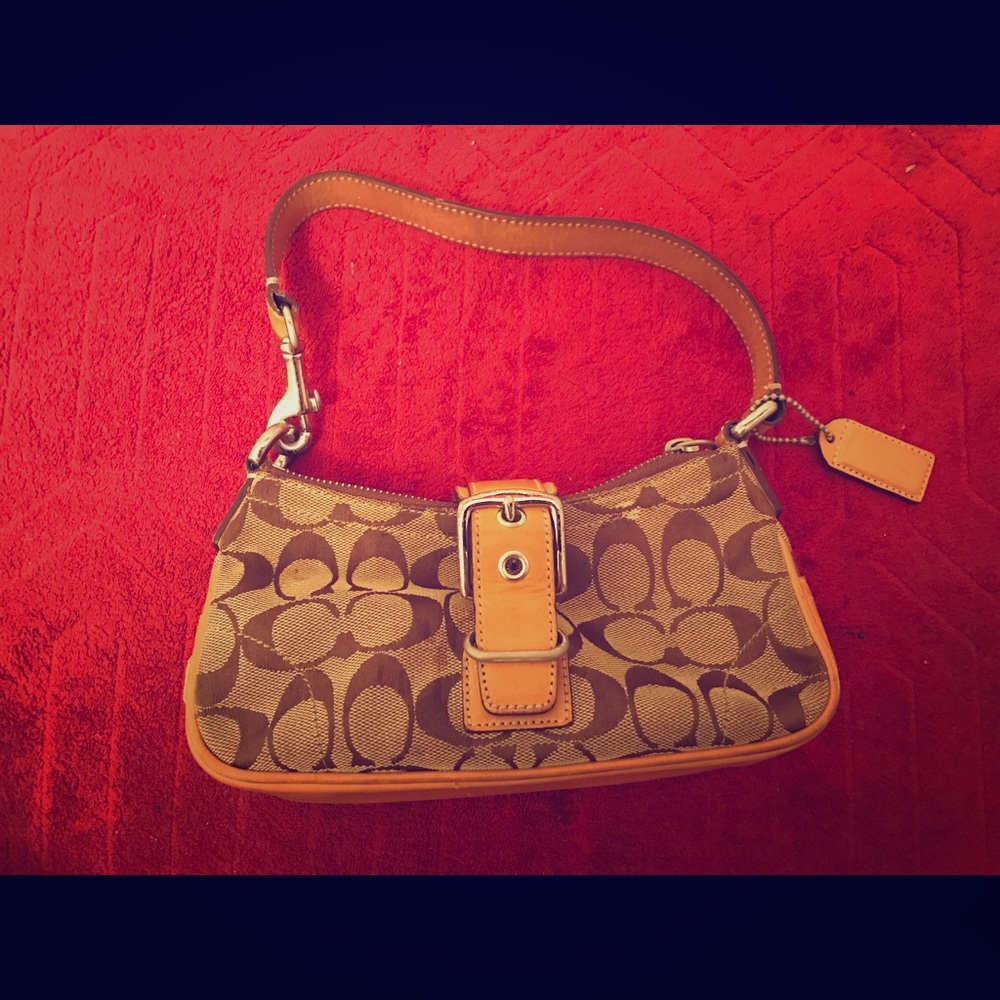 Small tan and brown Coach purse No. F042-6362